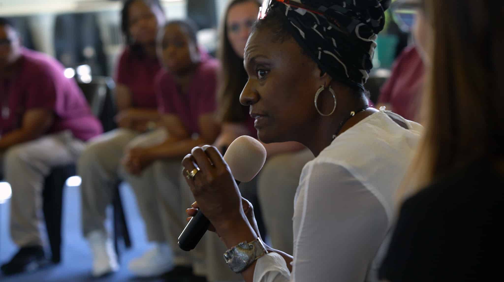 Dr Sabrina N'Diaye facilitating a healing group for incarcerated women at the Indiana Women's Prison